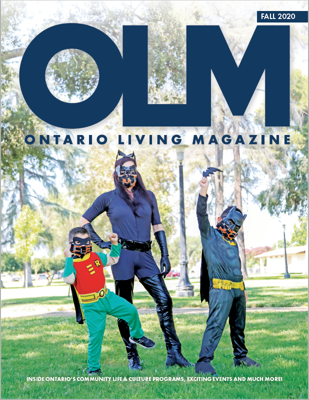 Autumn 2020 cover featuring a mother dressed as catwoman and her two children dressed as batman and robin.